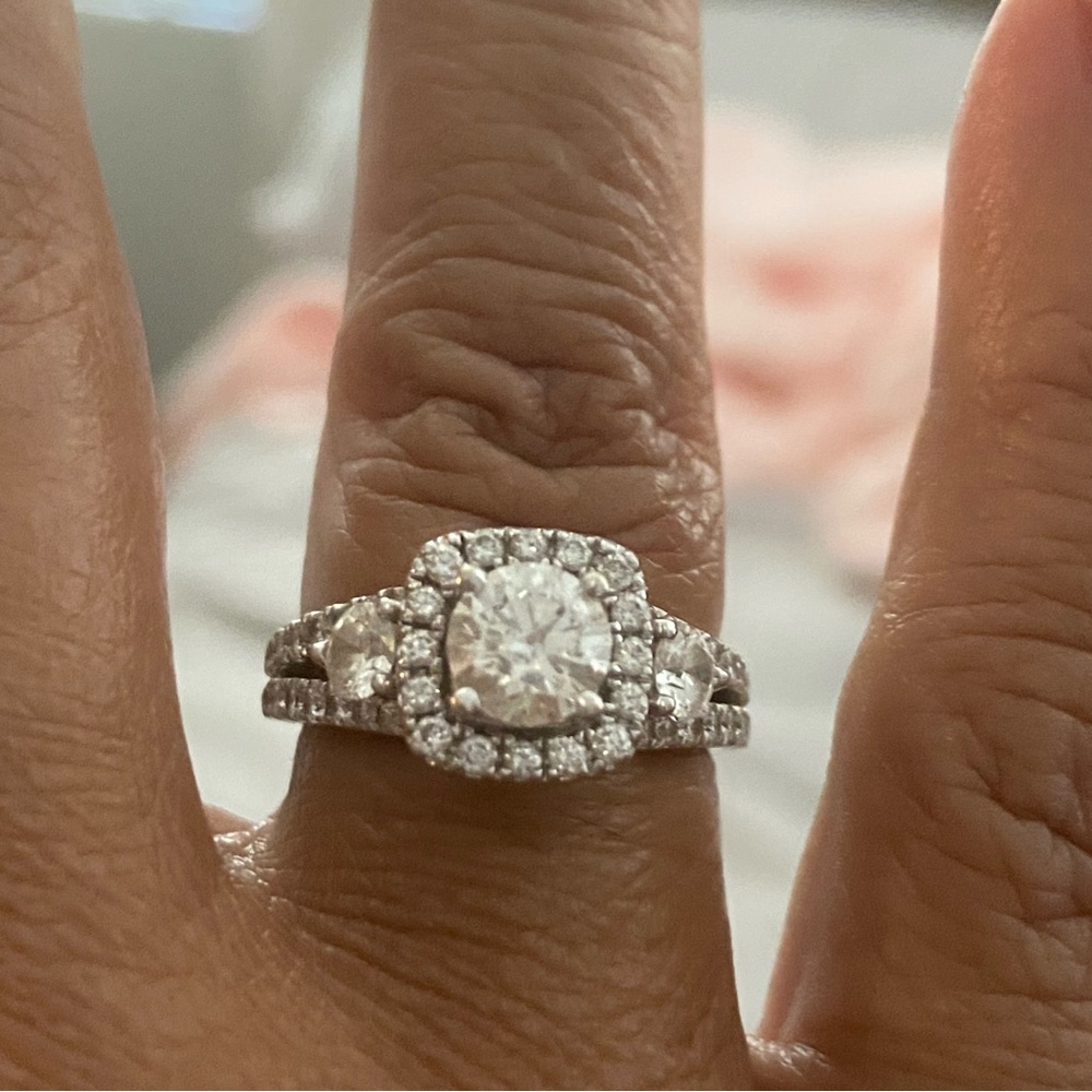 14 karat white gold ideal round-cut diamond bridal ring. See grading report.